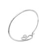 Snake-silver-bangle-side-Nueve-Sterling